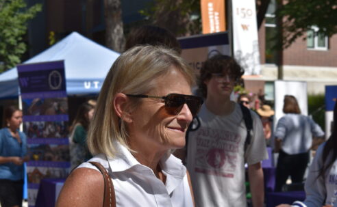 President Beth Dobkin smiling at the Student Wellness Fair in Richer Commons.